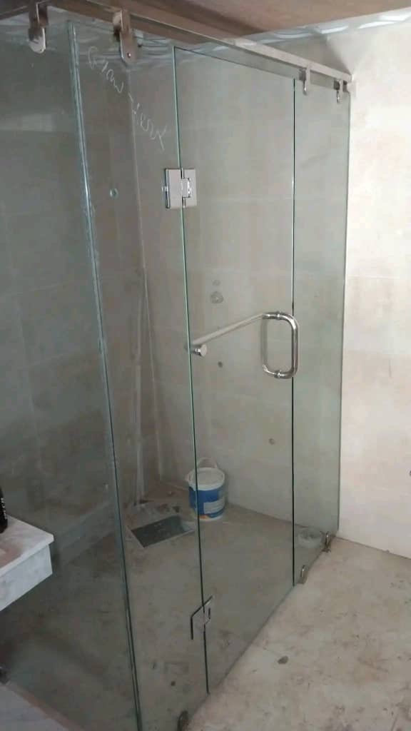 Glass shower enclosures